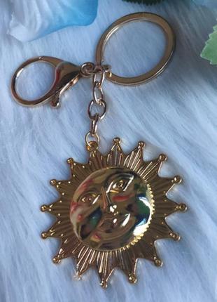 Брелок на ключі сонце-солодка великий колір-золотистий