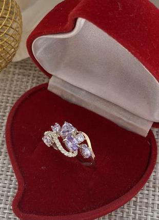 Срібне кільце з золотими вставками