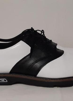 Супер стильные спортивные туфли reebok. нат.кожа, шипованные2 фото