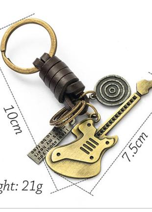 Брелок на ключи металл гитара оплетка под кожу цвет как бронза