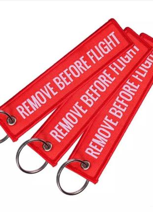 Брелок ремувка красная remove before flight прямоугольная двухстонняя вышивка снять после полета