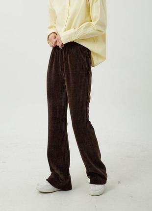 Мягкие вельветовые расклешенные брюки hang eleven цвета хаки кльош1 фото