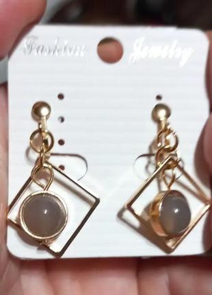 Кліпси сережки сережки (без проколювання) пр-во корея золотистий метал ромб всередині коло