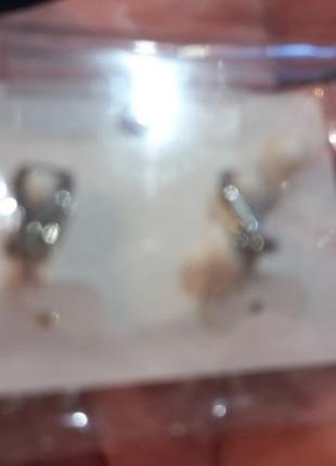 Клипсы серьги сережки (без прокола) металл пр-во корея серебристые завитушки 3см на 2см стильно2 фото