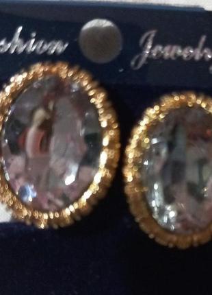 Кліпси сережки сережки (без проколювання) золотистий метал пр-во корея овал біло-сірий камінь 2 см на 2.5 см