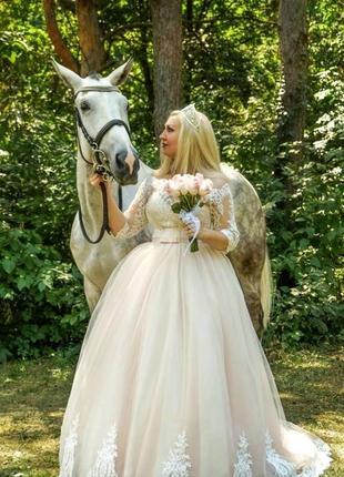 Весільна сукня 54 розміру (б/у)1 фото