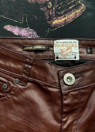Джинсы брюки из эко кожи parisian бордовые размер м9 фото