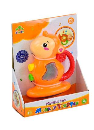 Музична іграшка для дітей брязкальце мавпочка на аркуші2 фото