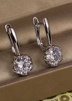 Серьги  xuping jewelry величавая простота с белым камнем 2.3 см серебристые2 фото