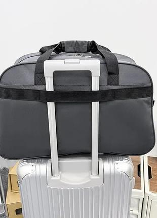 Дорожная сумка sport женская мужская спортивная туристическая 55 литров черная7 фото