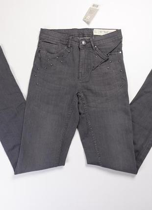 Супер скинії джинси сірі з прикрашені заклепками з високою поса..3 фото