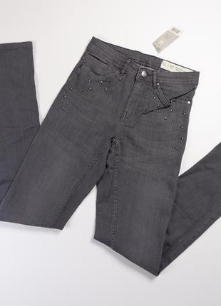 Супер скинії джинси сірі з прикрашені заклепками з високою поса..5 фото