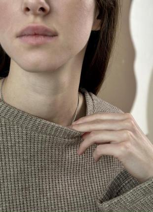М'який бежевий жіночий светр зі спущеним рукавом niagara_brand...7 фото