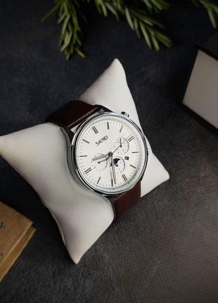 Чоловічий наручний годинник skmei 9117 brown/white2 фото