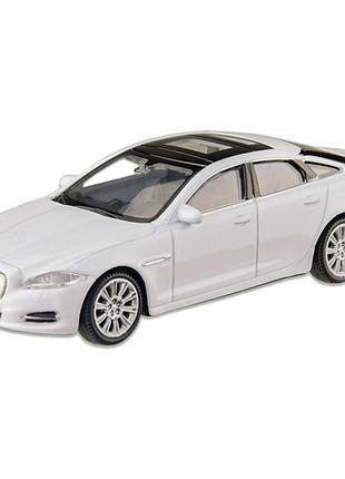 Машина металлическая jaguar xj "welly" 44040cw масштаб 1:43 белый