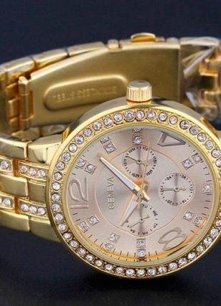 Гарний жіночий годинник із кварцовим механізмом geneva gold2 фото