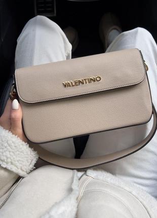 Бежева жіноча сумка в стилі valentino3 фото