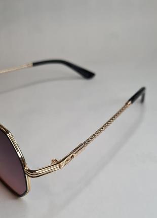 Стильні сонцезахисні окуляри4 фото