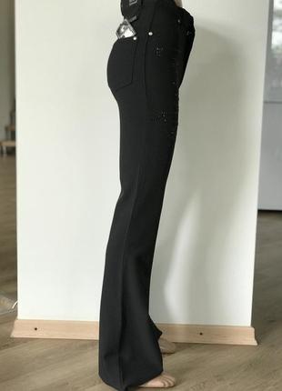 Жіночі чорні штани кльош від коліна висока талія3 фото
