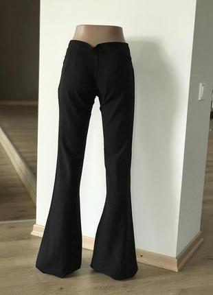 Жіночі чорні штани кльош від коліна висока талія7 фото