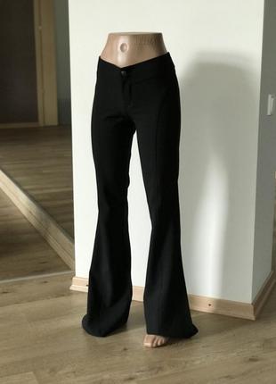 Жіночі чорні штани кльош від коліна висока талія9 фото