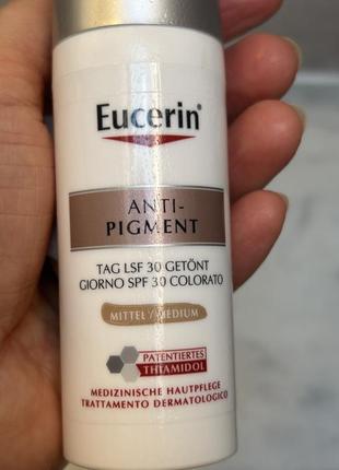 Тональний крем для обличчя eucerin anti- pigment tinted day care, spf 30, medium, 50 мл5 фото