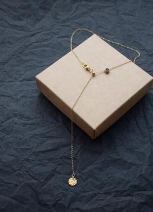 Золотистая цепочка с синим  кристаллом в стиле минимализм , кристалл на шею2 фото
