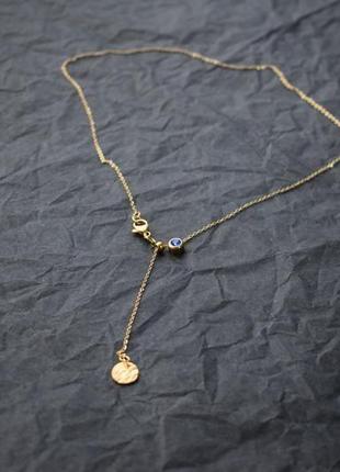 Золотистая цепочка с синим  кристаллом в стиле минимализм , кристалл на шею5 фото