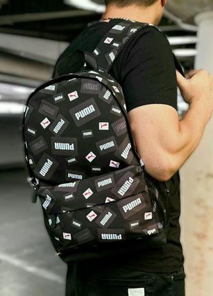 Стильний чорний міський рюкзак з принтом puma, пума.2 фото