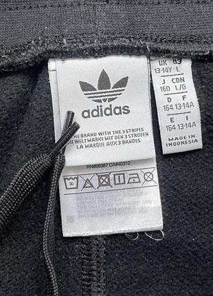 Теплі спортивні штани adidas на підлітка6 фото