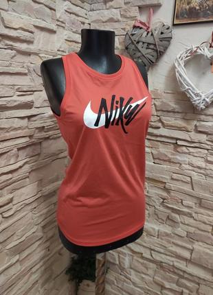 Красивая спортивная оранжевая с логотипом майка nike tee dri-fit2 фото