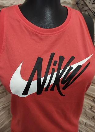 Красивая спортивная оранжевая с логотипом майка nike tee dri-fit4 фото