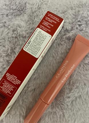 Clarins natural lip perfector блеск для губ с увлажняющим эффектом, 05 оттенок9 фото