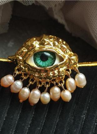 Кільце око в стилі schiaparelli з натуральними перлинами.