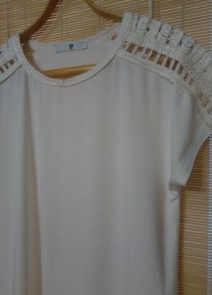 Біла блузка з ажурним  плетінням8 фото