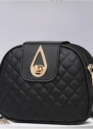 Жіноча сумочка на ремінці чорна з екошкіри стильна сумка через...