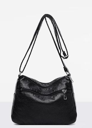 Сучасна жіноча чорна сумка через плече з екошкіри, модна тренд...3 фото