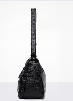 Сучасна жіноча чорна сумка через плече з екошкіри, модна тренд...7 фото