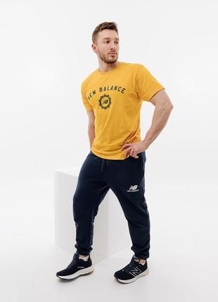 Штани new balance essentials stacked logo