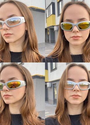 Стильные  солнцезащитные очки с полумесяцем5 фото