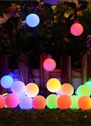 Гірлянда кольорова новорічна мерехтлива кульки 28 led-лампочок...7 фото