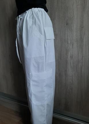 Lareida стильные дизайнерские брюки с карманами2 фото