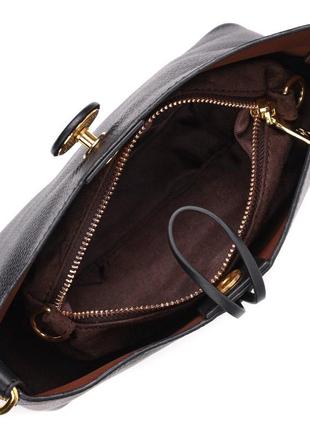 Жіноча сумка з оригінальною застібкою ґудзиком із натуральної ...4 фото