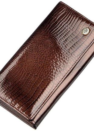 Жіночий гаманець із монетницею на клямці st leather 18906 кори...