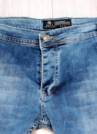 Шорти джинсові чоловічі сині з потертостями звужені на манж...2 фото