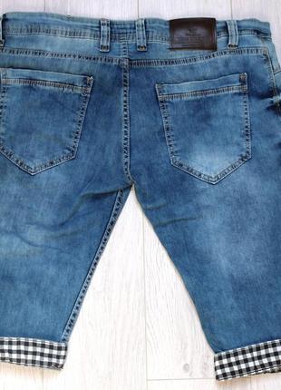 Шорти джинсові чоловічі сині з потертостями звужені на манж...6 фото