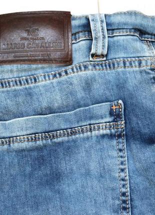 Шорти джинсові чоловічі сині з потертостями звужені на манж...8 фото