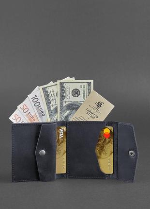Жіночий шкіряний маленький гаманець потрійного складання з мон...5 фото