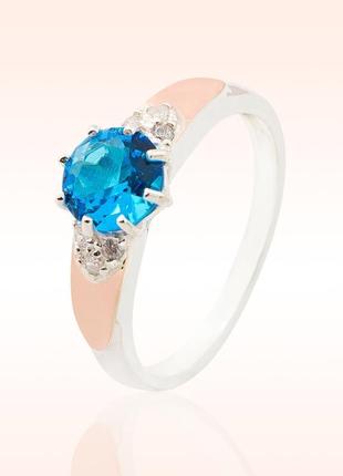 Срібне кільце з золотими вставками