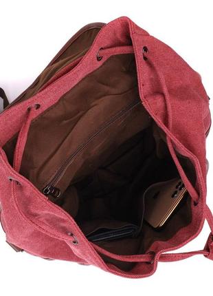 Зручний текстильний рюкзак, що закривається клапаном на магніт...4 фото